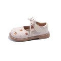Elegant toddler girls cream Mary Jane shoes featuring floral embroidery and bow detail. - Off White