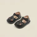 Schwarze Lauflernschuhe aus Lederimitat für Jungen und Mädchen mit praktischem Klettverschluss - Schwarz