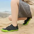 Rutschfeste Kinder-Wasserschuhe in Schwarz und Grün ideal für Strand und Schwimmen - Schwarz Grün