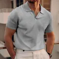 Dettaglio polo da uomo in maglia a nido d'ape grigia con colletto a rever - Taglia S / Top / Grigio