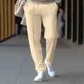 Close-up detail of men's beige straight-leg casual pants featuring a stylish front seam - M / Bottoms / Apricot