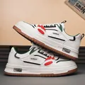 Trendy white casual sneakers for men featuring stylish green and red accents and unique logo details. - 39 / Beige Green