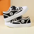 Schwarz-weiße Kinder-Leinenschuhe mit Klettverschluss und einer dicken Gummisohle - 21 / Schwarz