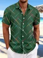 Detail of men's casual green short sleeve beach shirt featuring vibrant streak patterns - S / Tops / Dark Green