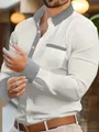 Detail of men's white long-sleeve shirt with houndstooth patterned collar and cuffs - S / Tops / White
