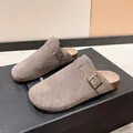 Taupe suede clogs with cork sole and buckle strap on black display box - Gray