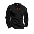 Close-up of a black long-sleeve Henley shirt featuring orange contrast stitch details - S / Tops / Black
