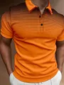 Detalle macro de polo naranja con patrón de degradado de puntos negros en el pecho. - S / Tops / Naranja