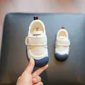 White baby indoor canvas shoes featuring soft blue soles and easy velcro straps - Size 29 (Inner 18.5cm) / Blue