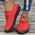 Vibrant red handmade women's casual flat shoes with soft rubber soles and stitched detail - 35 / Red