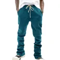 Close-up detail of teal men's heavy micro-flare pants with adjustable cream drawstring - S / Bottoms / Navy Blue