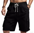 Macro view of black slub linen cargo shorts featuring drawstring waist and side pocket - Black