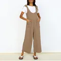 Detail view of brown wide leg jumpsuit with large pockets and shoulder ties - Khaki