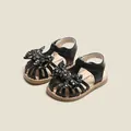 Sandales noires pour bébé fille avec nœud floral décoratif et semelle souple antidérapante - Longueur Intérieure 15.5cm / Style Nœud Floral (20MBX2501) / Noir