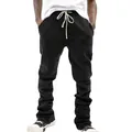 Photo de studio professionnelle de joggings noirs pour hommes avec cordon de serrage - Noir