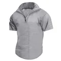 Detalle de la textura de nido de abeja y cuello con cremallera en polo gris. - S / Tops / Gris claro