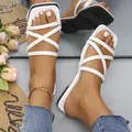Chic white square toe flat sandals for women featuring elegant cross strap beach design - 35 / White
