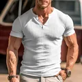 Detailed view of white ribbed Henley shirt featuring slim fit design and buttoned neckline - S / Tops / White