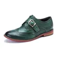 Side view of women's handmade green leather wingtip monk strap loafers with colorful stitching - 36 / Green