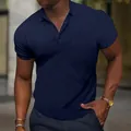 Close-up of navy blue waffle texture polo shirt showing the slim fit design and collar detail - S / Tops / Navy Blue