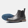 Dettaglio di stivaletti Chelsea Brogue in pelle grigio scuro con robuste suole blu - 41 (US 8) / Grigio Scuro Vintage (AL641)