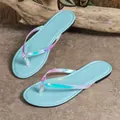 Women's light blue flip-flop sandals featuring vibrant iridescent holographic straps - 38 / Sky Blue