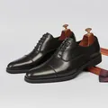 Elegant black leather Oxford dress shoes for men featuring a classic lace-up design - 38 / Black