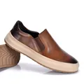Close-up view of premium brown leather slip-on loafers featuring a thick beige comfort sole - 38 / Tan