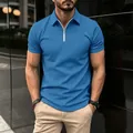 Close-up view of the blue waffle-textured men's polo shirt featuring a modern zipper collar - S / Tops / Blue