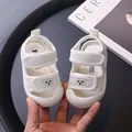 Breathable mesh baby sandals with cute bear patch and soft non-slip soles for summer. - White
