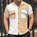 Detailed view of men's color-block waffle knit short sleeve shirt with chest pockets - S / Tops / Khaki/White