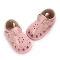 Pink baby girl walking sandals with flower cut-outs and soft soles for infants - Pink