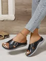 Stylish black wedge sandals for women featuring crossover straps and gold buckle detail - 36 / Black