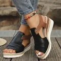 Elegant women's black and brown wedge sandals with a textured rope platform sole detail - Black