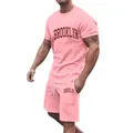 Men's pink summer athletic leisure suit featuring Brooklyn print and drawstring shorts. - Pink