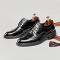 Elegant men's black leather Brogue shoes with classic wingtip perforation detail - Black