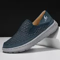 Breathable navy blue men's mesh loafers featuring soft grey soles and casual slip-on style - 38 / Blue