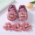 Detailed view of pink soft sole baby princess shoes and matching floral headband set - Pink (With Headband)