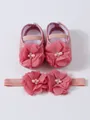 Close-up of pink baby princess shoes and matching floral headband set with pearl details - Size 11 (Inner Length 10.5CM) / Shoes And Headband Set / Pink