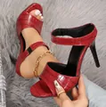Elegant red crocodile textured high heel sandals featuring peep toe and slim stiletto heels - Red