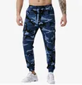 Detail view of men's blue camouflage joggers with cargo pockets and elastic cuffs - M / Bottoms / Denim Blue