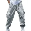 Detail shot of gray multi-pocket cargo joggers with white drawstring and elastic cuffs. - S / Bottoms / Slate Gray