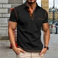 Detail van heren zwart poloshirt met bruine contraststiksels en borstzak. - S / Tops / Zwart