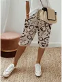 Vue détaillée du pantalon décontracté en lin pour femme avec motif de cercles noirs - S / Bas / Kaki Imprimé