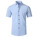 Front view detail of a light blue short-sleeved business shirt for men with black buttons - Light Blue