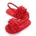 Macro detailed view of red ruffled baby girl sandals featuring gold polka dot insoles - Insole Length 11cm / Red
