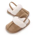 Close-up of baby winter slippers with soft faux fur lining and elastic back strap - Insole Length 11cm / Apricot