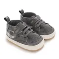 Detailed view of grey plaid baby walking shoes featuring secure double velcro straps - Gray