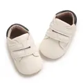 Detailed top view of off-white baby sports shoes with double velcro straps - Insole Length 11cm / White