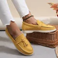 Detail view of yellow suede loafers for women featuring elegant metallic ring hardware - 43 / Tassel Metal Buckle Loafers (1012) / Yellow